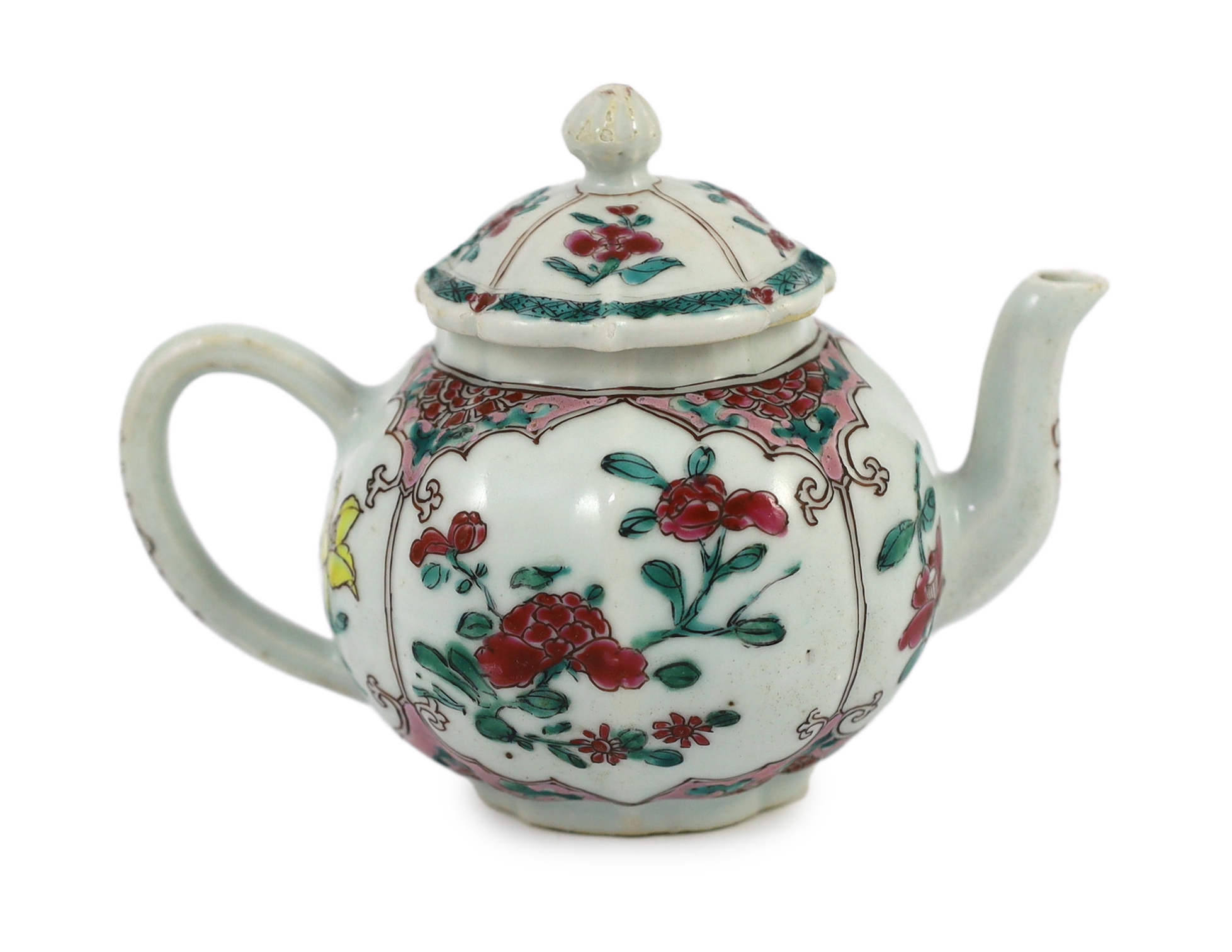 A Chinese famille rose petal lobed teapot, Yongzheng period, minor faults